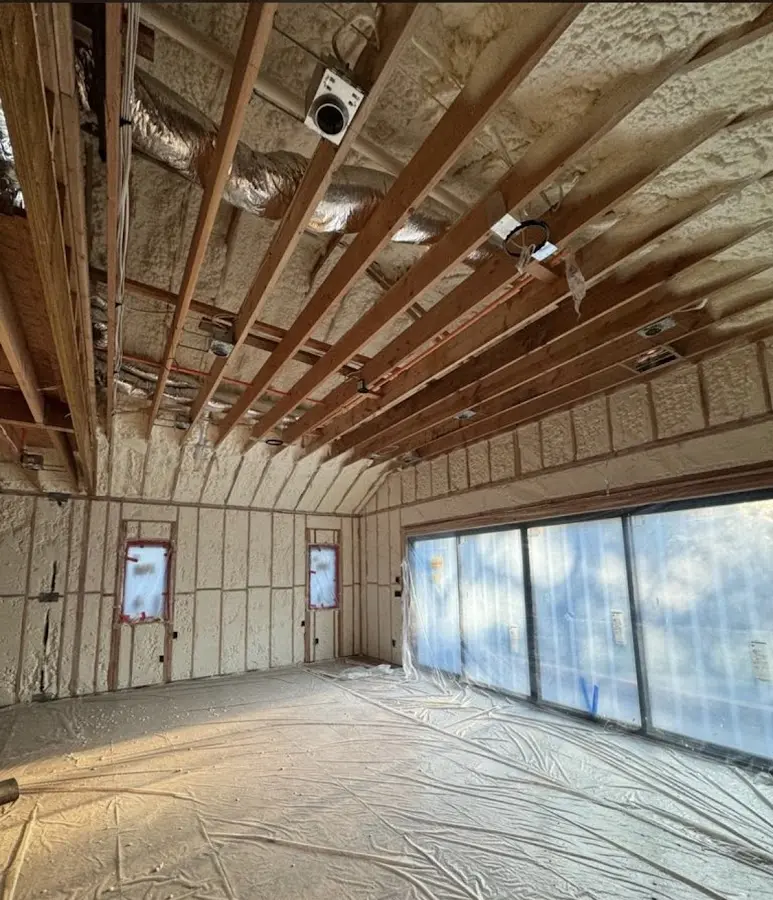 Interior walls and ceiling insulated with spray foam during new construction in Oak Brook
